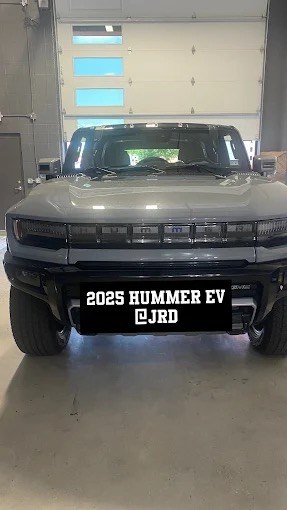 2025 GMC Hummer EV at JRD auto glass shop in Round Rock for windshield service